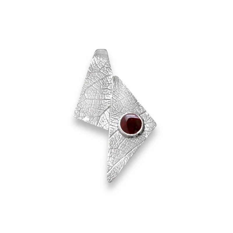 Sterling silver and Garnet pendant featuring the leaf texture